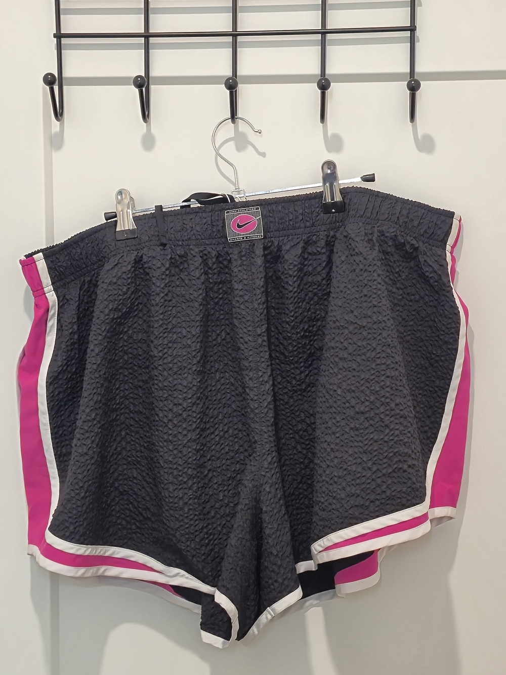 Nike Women's Black Athletic Shorts with Pink Side Panels